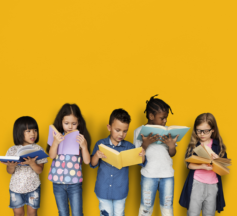 Shutterstock_638180248 Diverse Group Of Kids Study Read Book